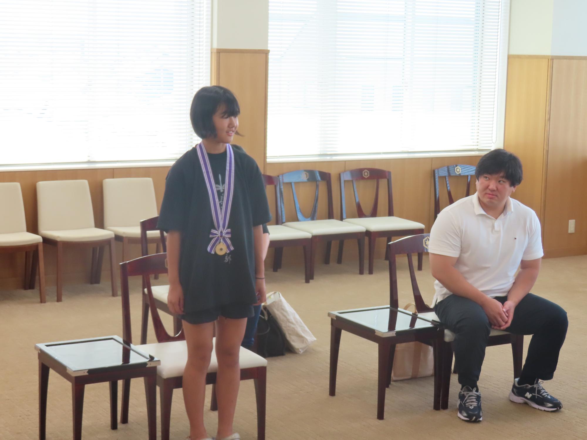 大会結果を報告する内田さん