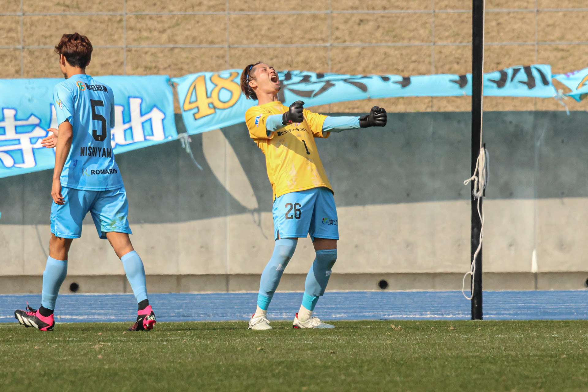 喜ぶゴールキーパーの様子