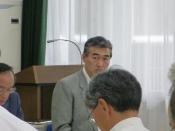 会議会場での市長の写真